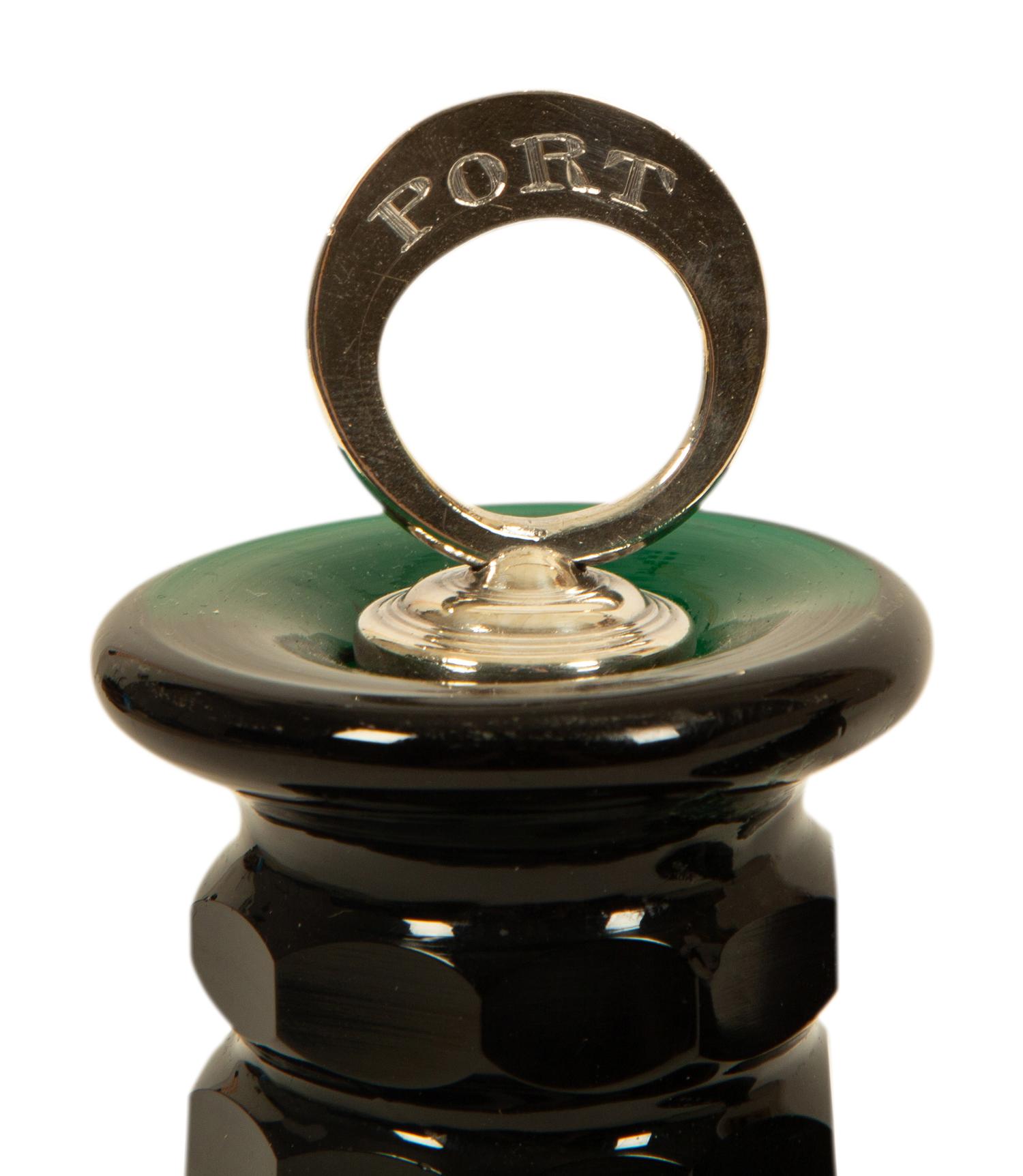 A Pair of Bristol Green Cut Glass Ship's Decanters with Silver Ring Stoppers