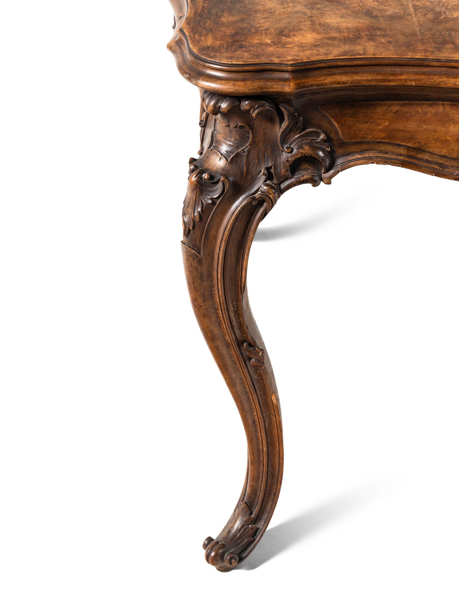 A Louis XV Style Carved Burl Walnut Dining Table
