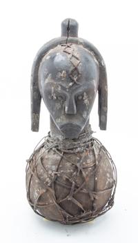 An Ethnographic Carved Wood and Metal Figure Height 19 3/4 inches.