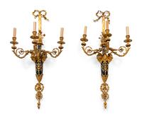 A Pair of Louis XVI Style Part Ebonized and Gilt-Bronze Three-Light Sconces