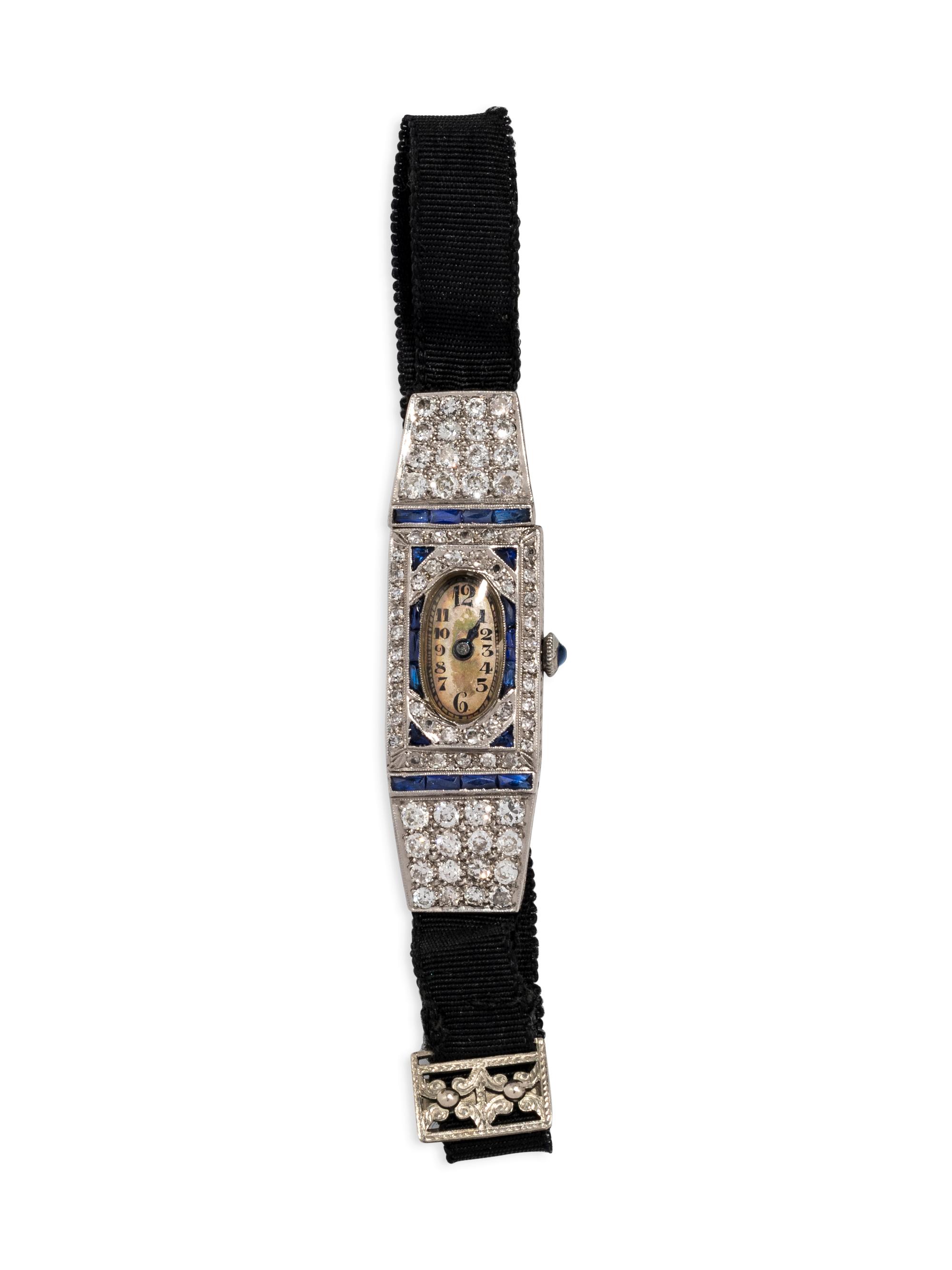 PLATINUM, DIAMOND AND SAPPHIRE WRISTWATCH
