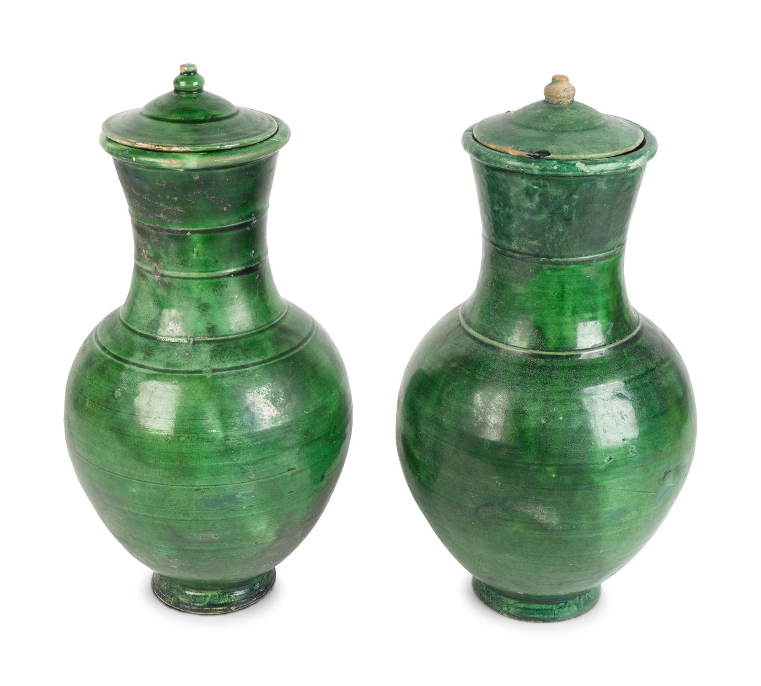 A Pair of Chinese Green-Glazed Terracotta Lidded Hu-Form Jars
