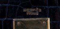 An Hermes 34cm Black Porosus Crocodile Kelly Handbag, 13" x 10" x 5".