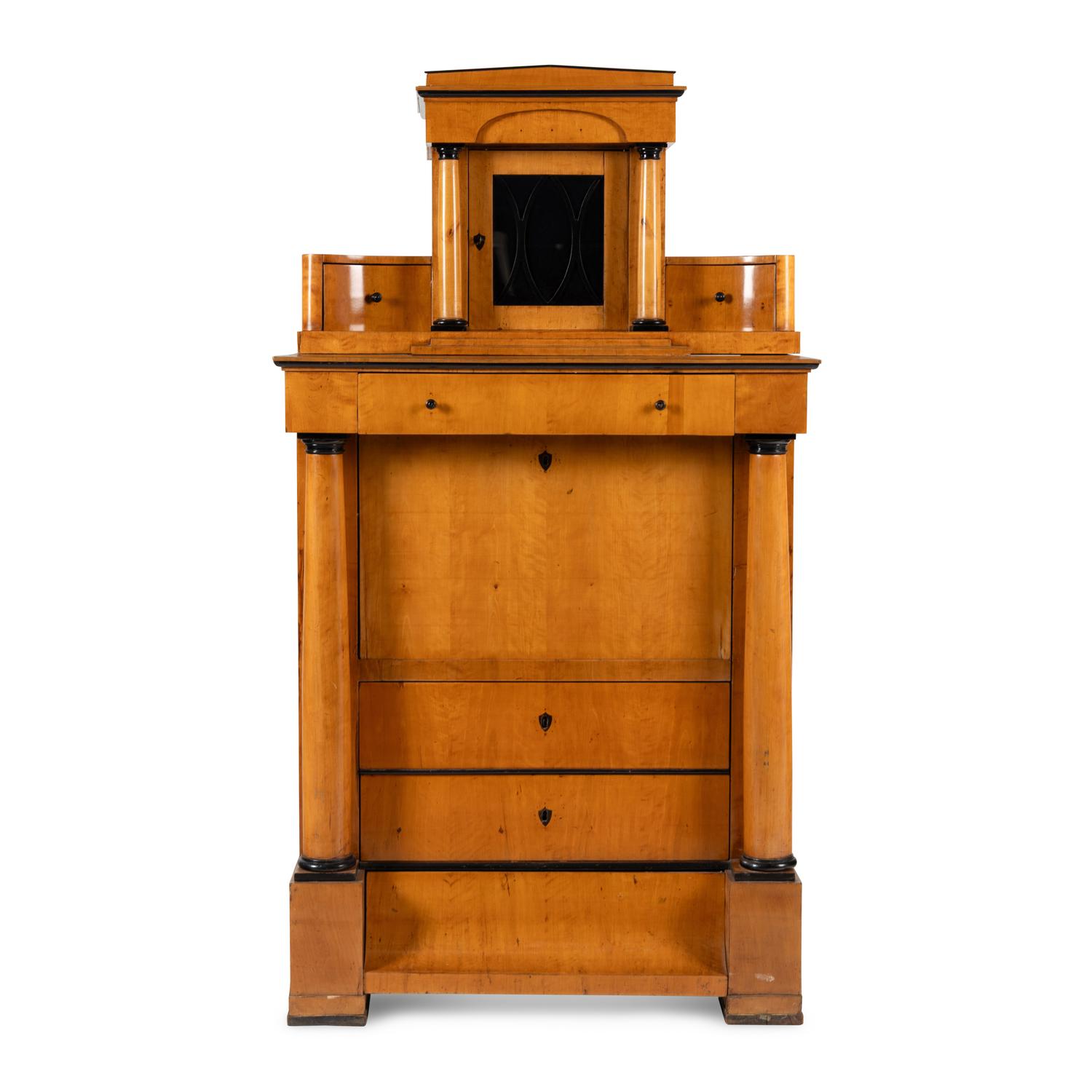 A Biedermeier Part-Ebonized Birch Bureau Cabinet