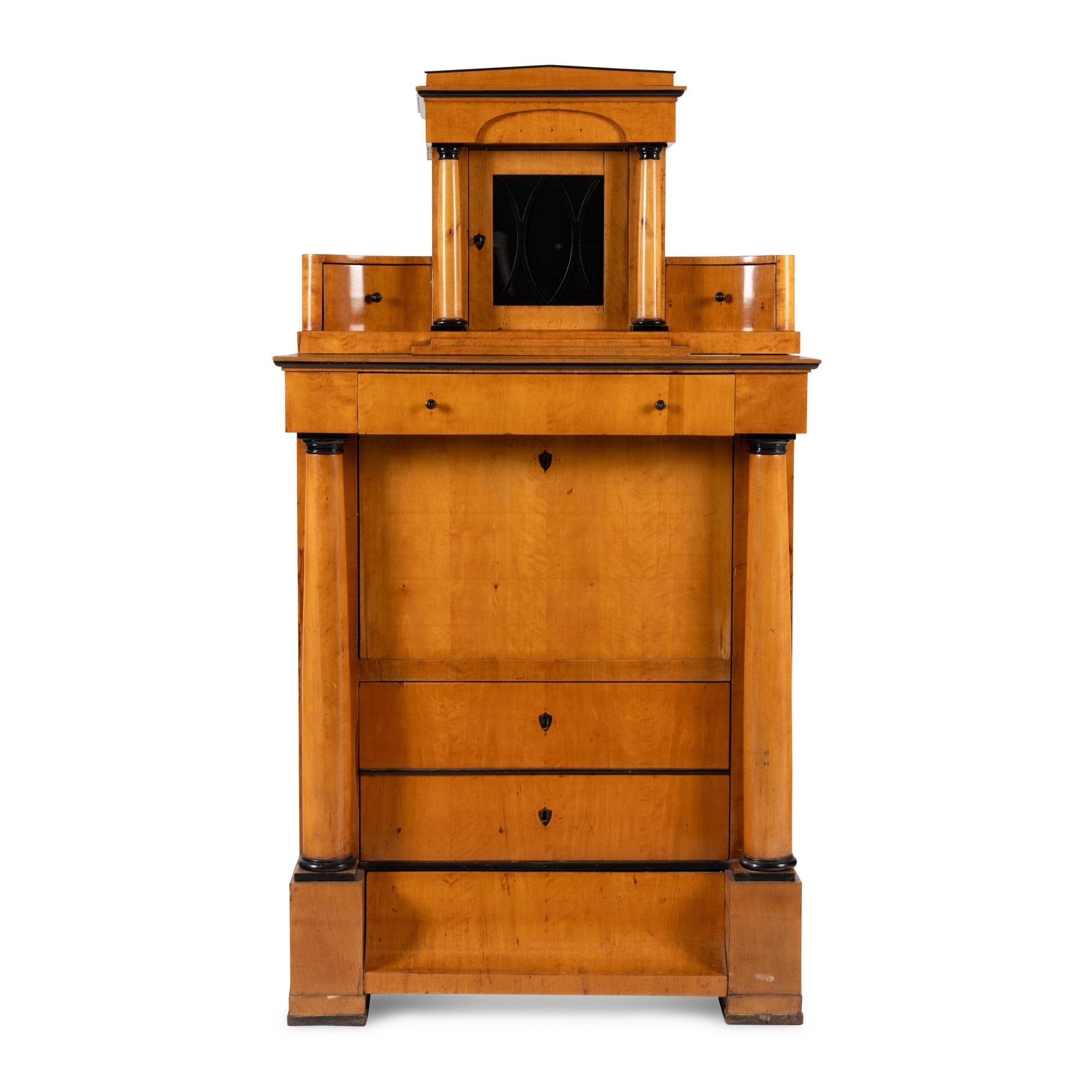 A Biedermeier Part-Ebonized Birch Bureau Cabinet