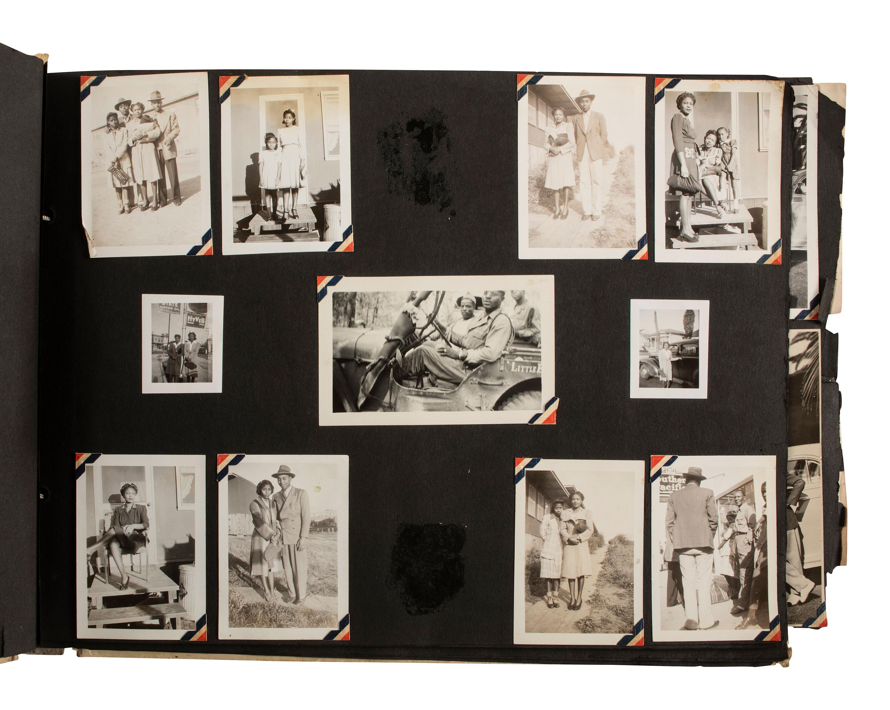[AFRICAN AMERICANA - EARLY PHOTOGRAPHY]. A group of 2 albums containing photographs of African American families, including snapshots of civilians and soldiers. Ca 1930s-1940s.