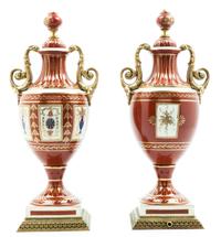 A Pair of Continental Porcelain Urns Height 16 inches.