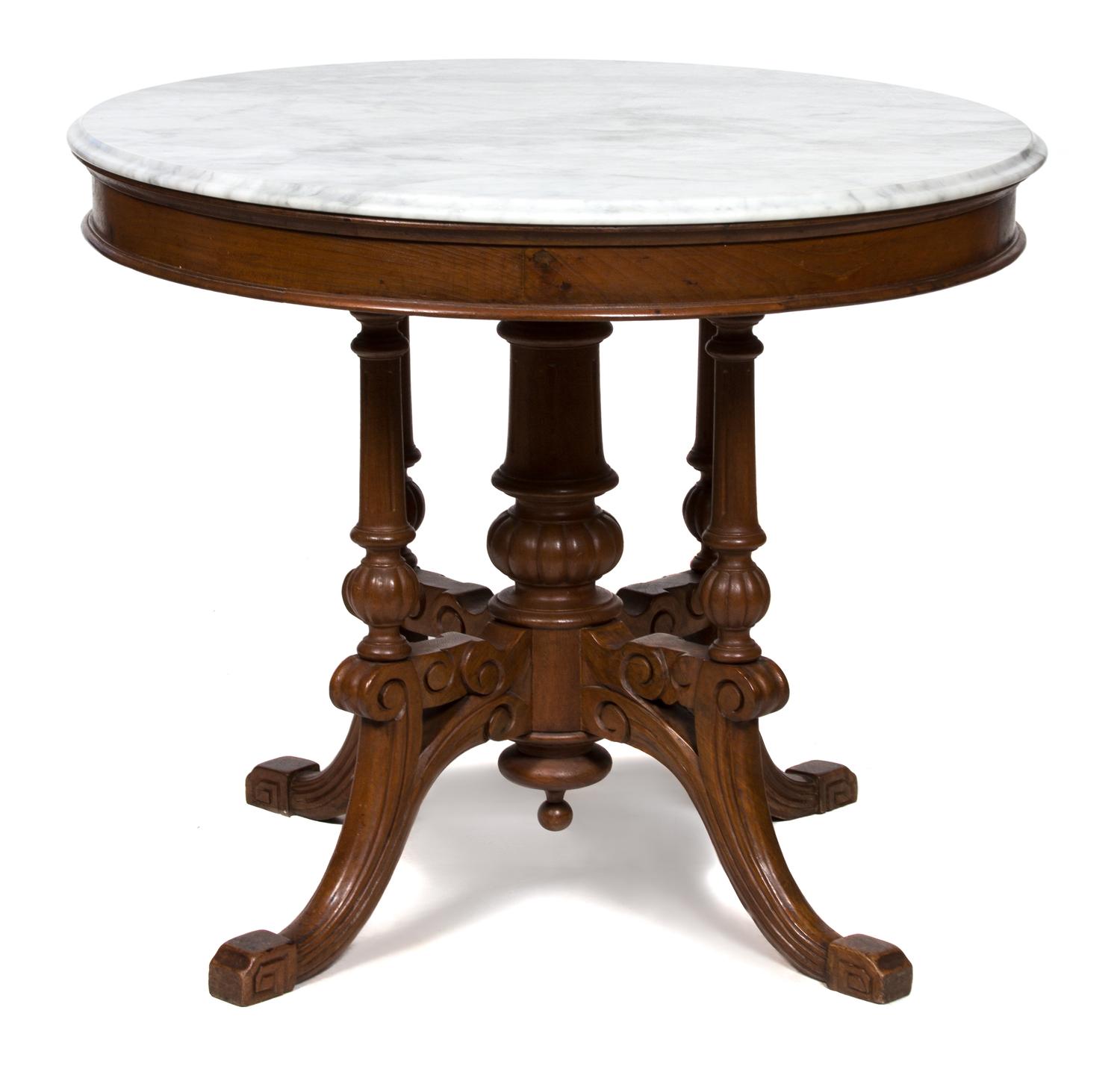 An English Regency Style Marble Top Table Height 30 x diameter 36 inches.