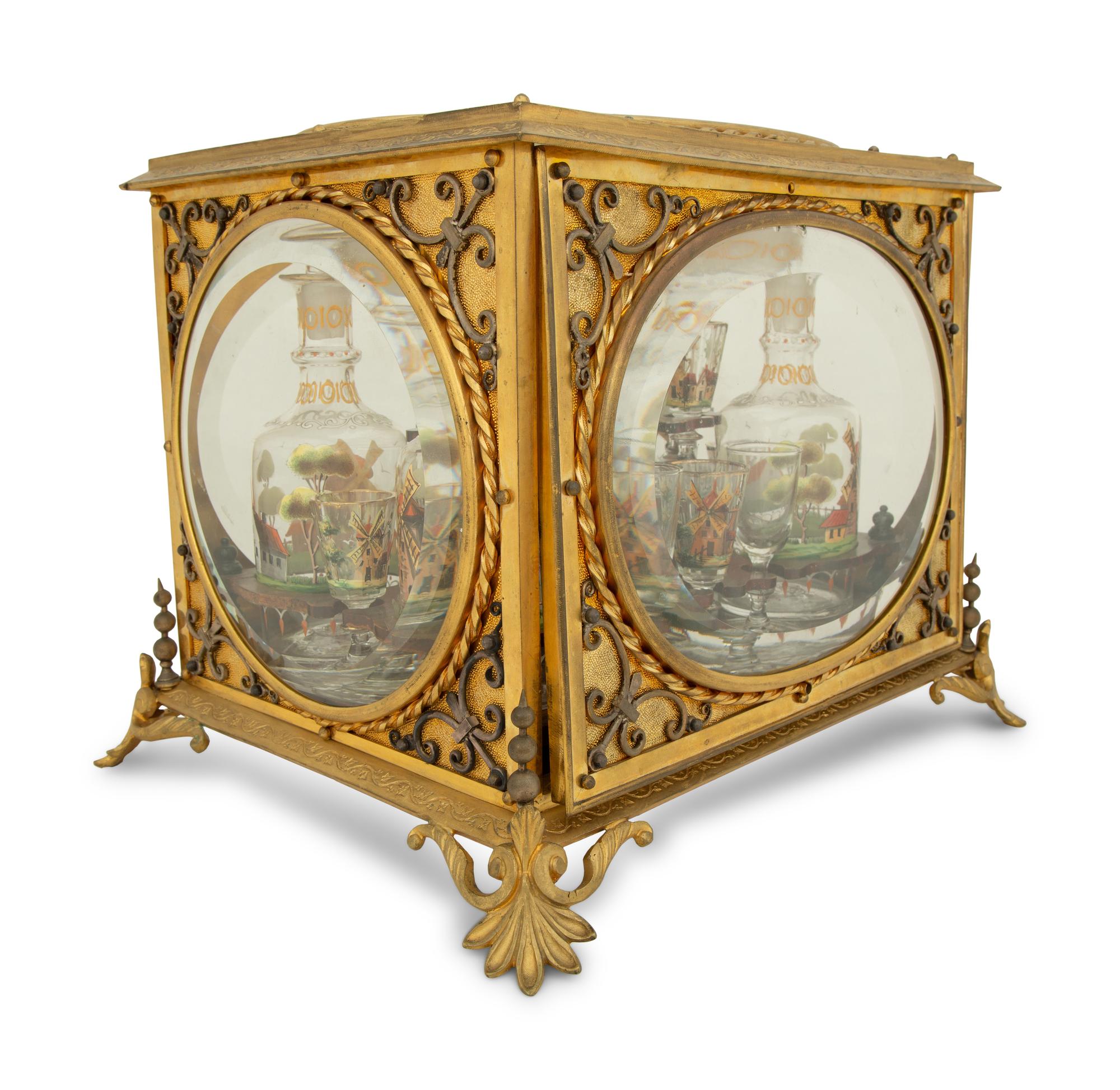 A French Gilt Bronze Cave à Liqueur with Enameled Glasses and Decanters — 19TH CENTURY