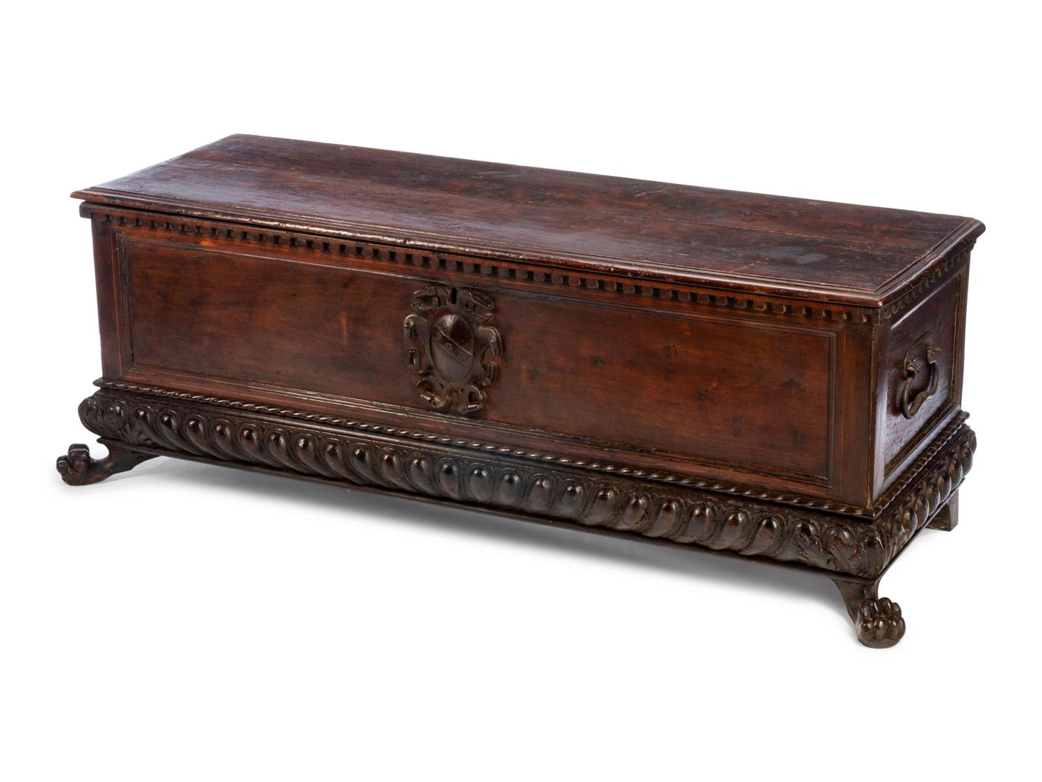 An Italian Carved Walnut Cassone