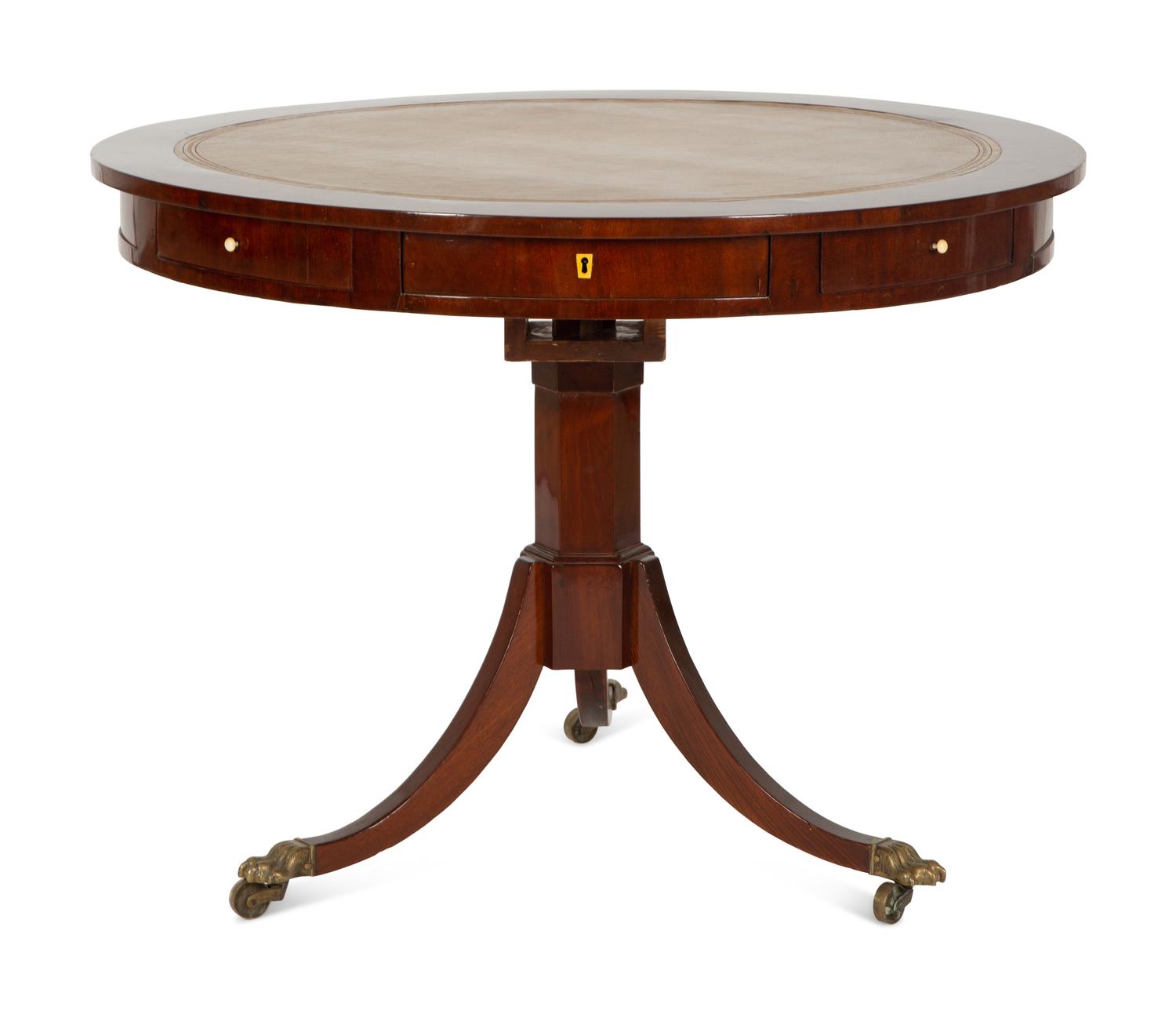 A Regency Style Mahogany Center Table with Inset Brown Leather Top — 20th Century