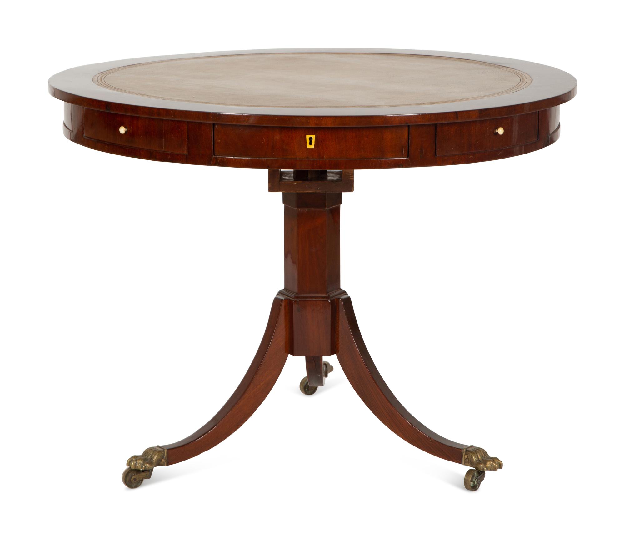 A Regency Style Mahogany Center Table with Inset Brown Leather Top — 20th Century