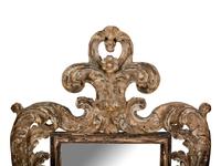 An Italian Baroque Style Painted and Parcel Gilt Mirror