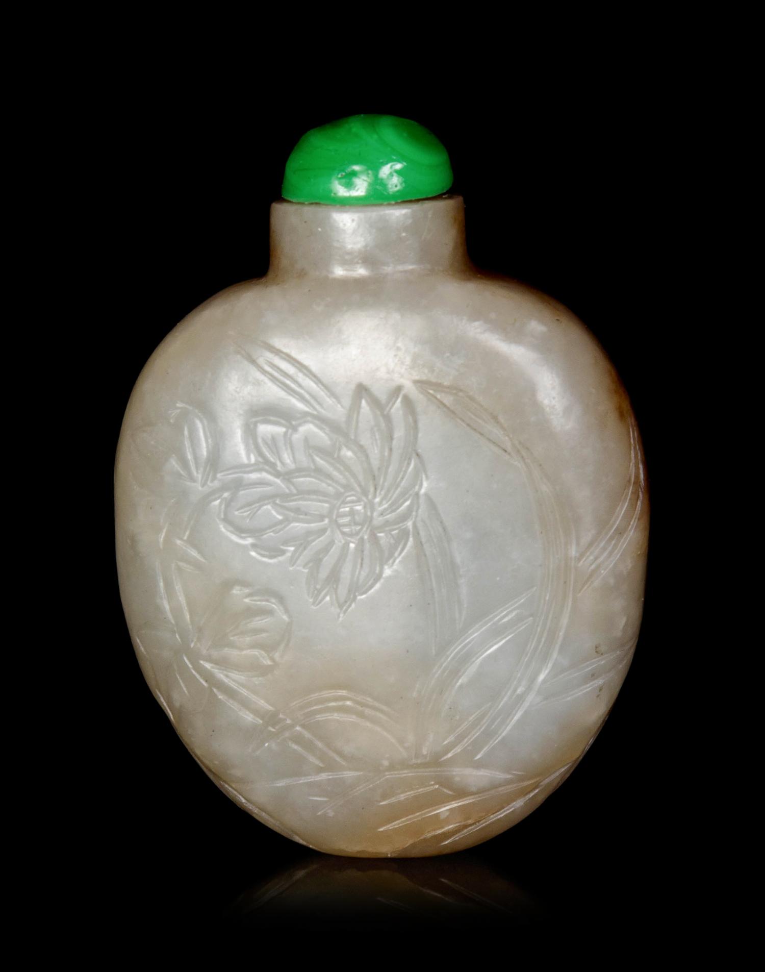 A Chinese Russet and Celadon Jade ‘Floral’ Snuff Bottle