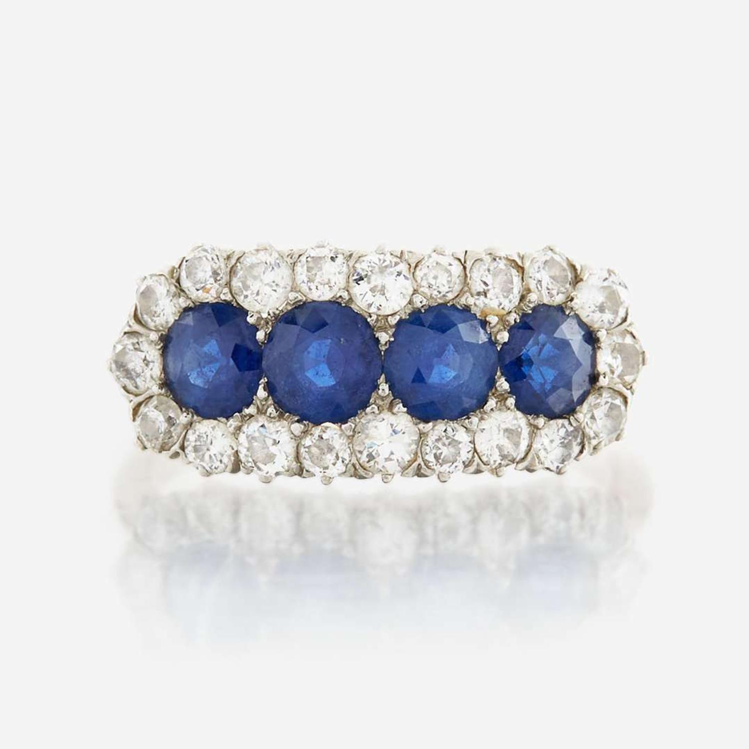 A sapphire, diamond, and gold ring