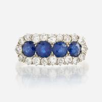 A sapphire, diamond, and gold ring