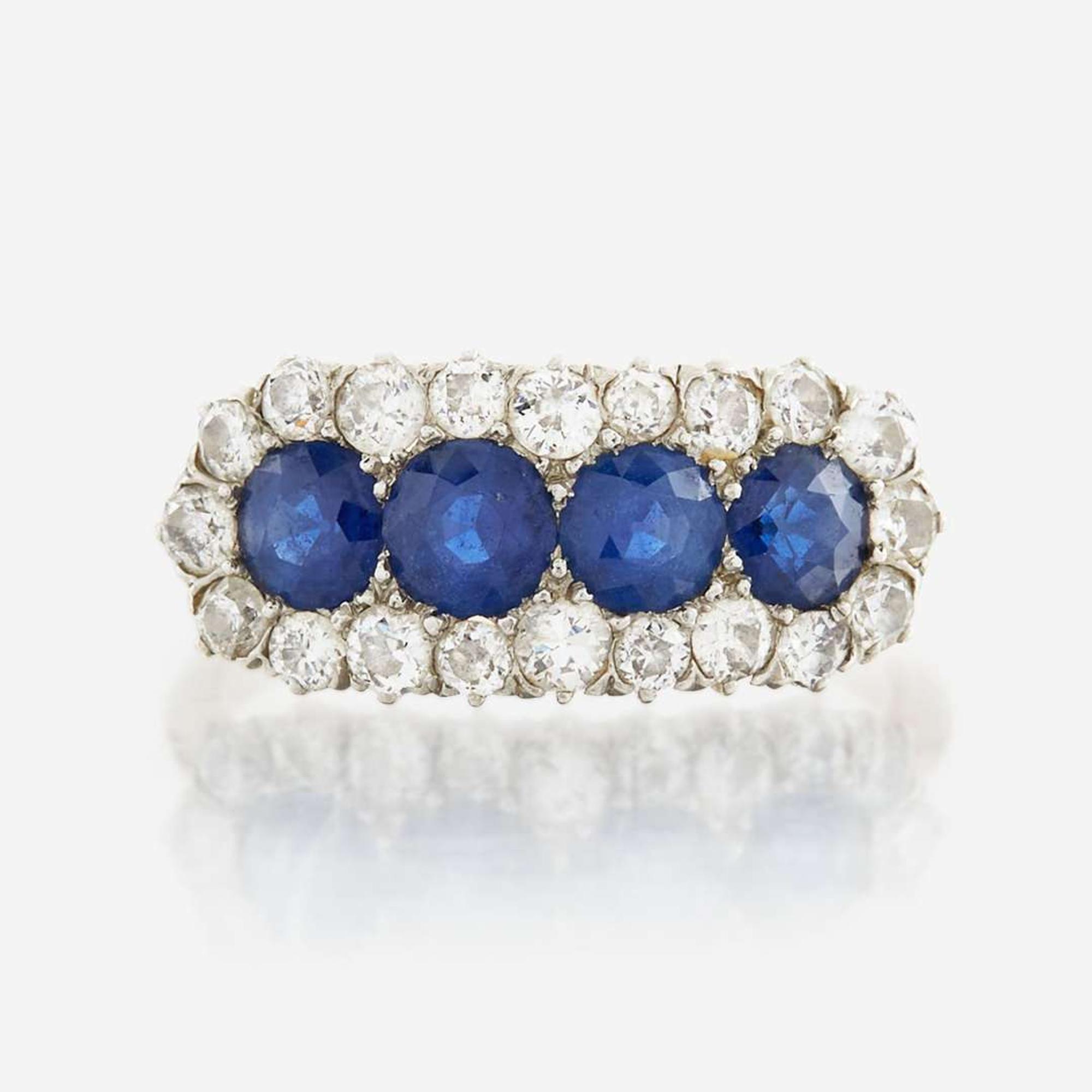 A sapphire, diamond, and gold ring