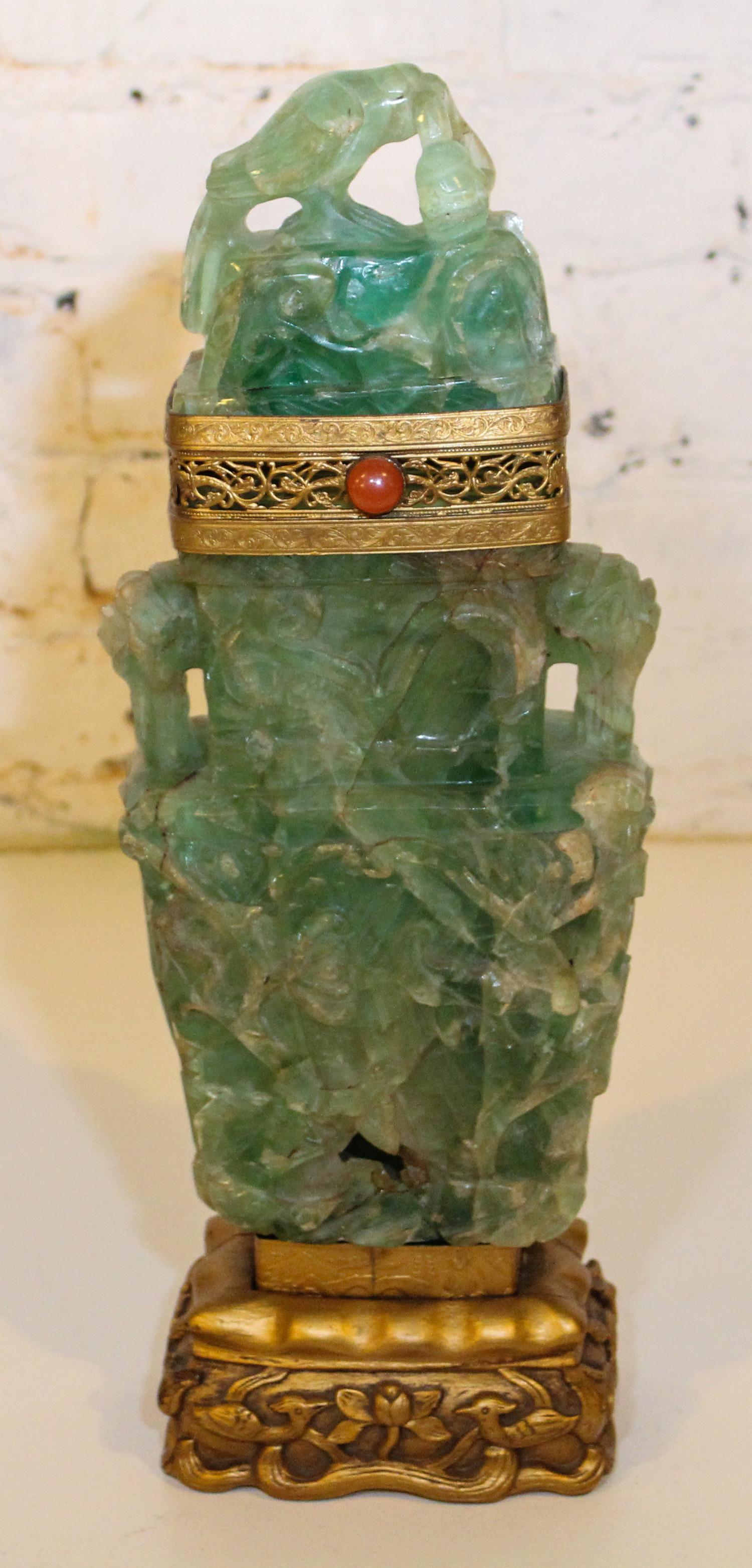A Chinese Carved Green Quartz Vase. Height overall 16 inches.
