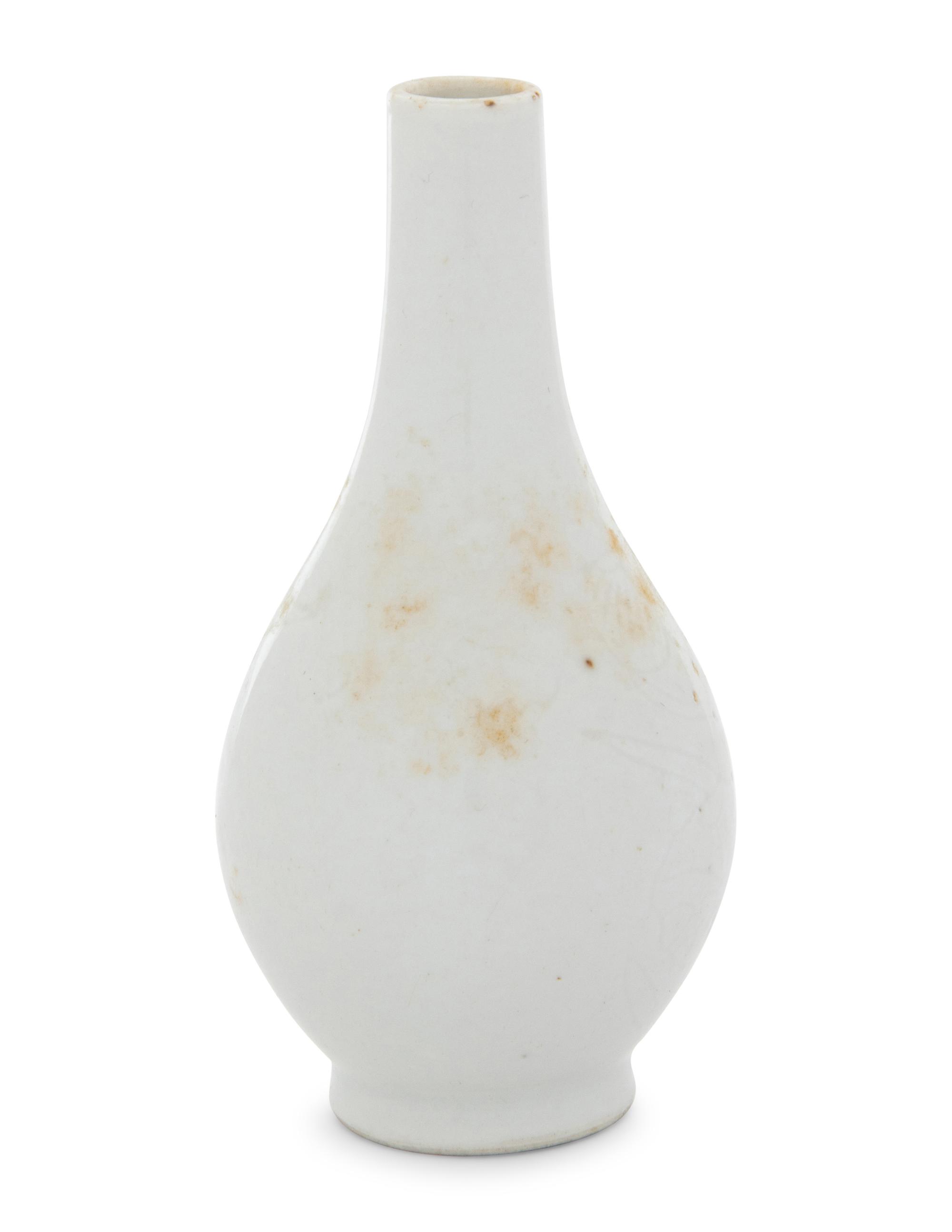 An Incised White Glazed Porcelain Bottle Vase