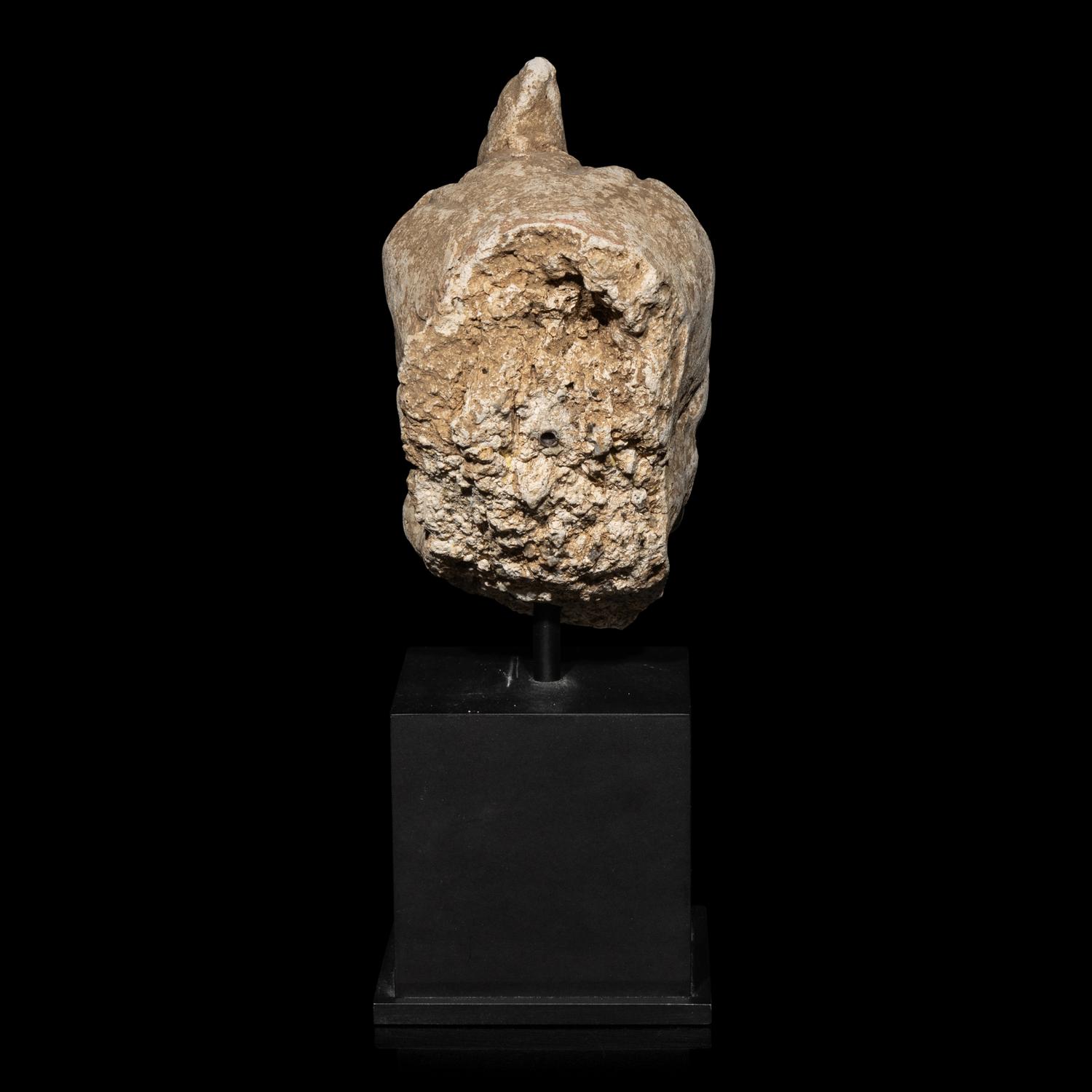 A Gandharan Stucco Head of Maitreya, Hadda Region, 4th/5th Century