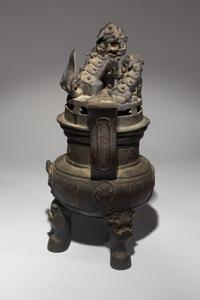 A Bronze Tripod Incense Burner and Cover
