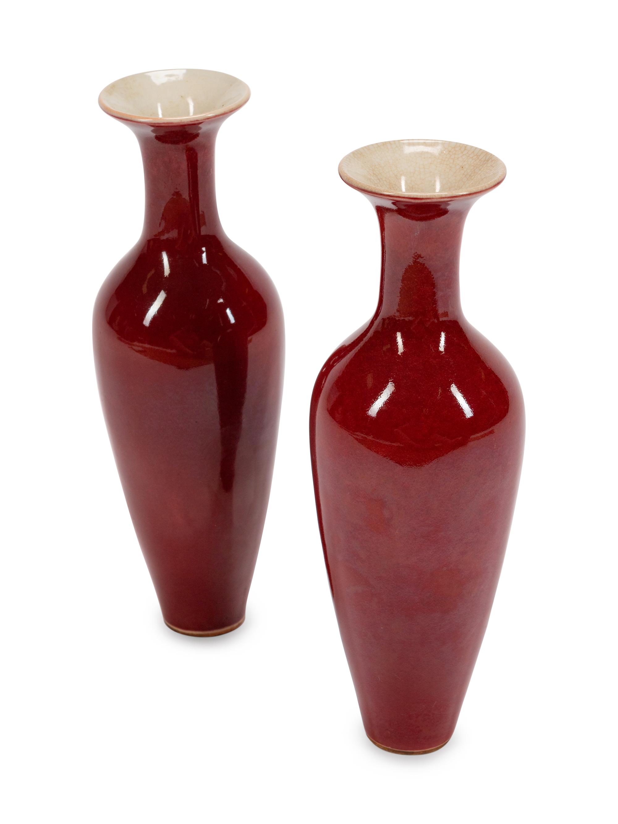 A Pair of Chinese Sang de Boeuf-Glazed Porcelain Shouldered Ovoid Vases