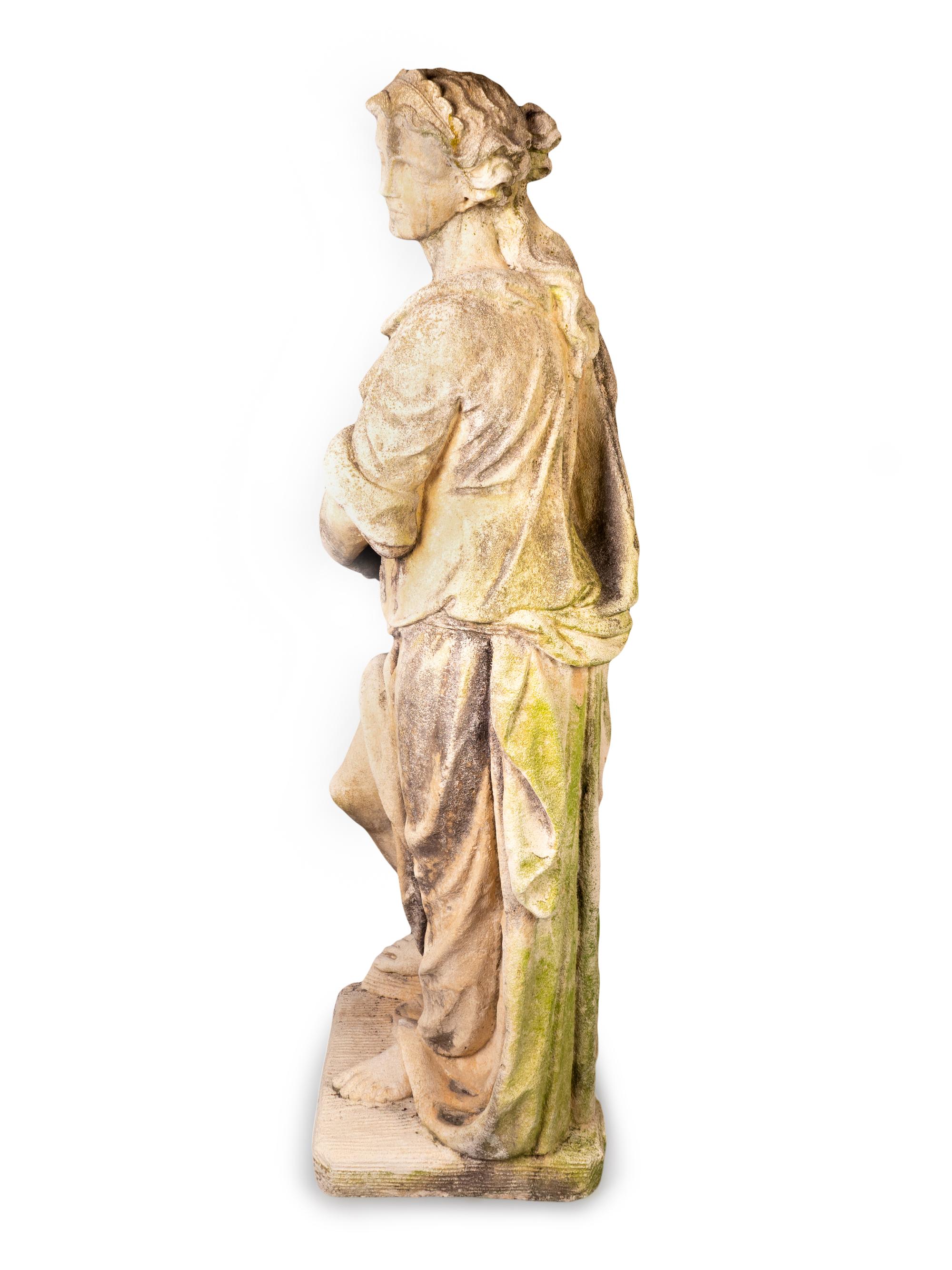 A Cast Stone Figure of Female in Classical Dress — 20TH CENTURY
