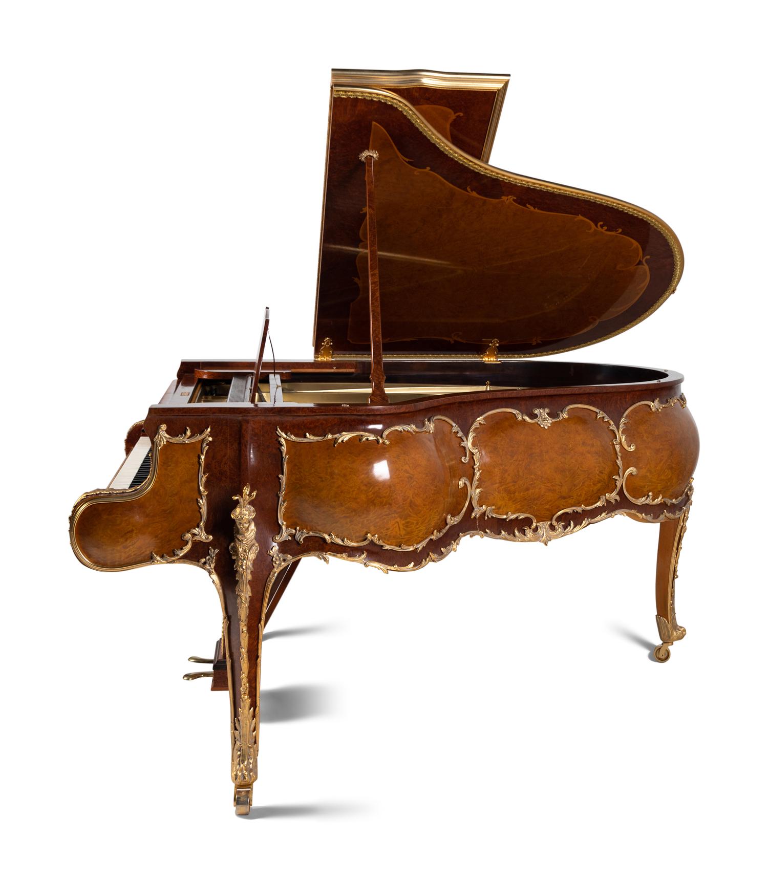 A Louis XV Style Gilt Metal Mounted Burlwood Piano