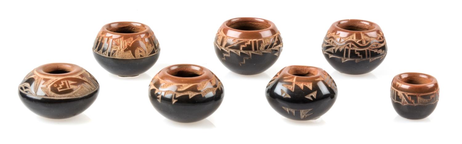 Seven Santa Clara Blackware Pottery Jars Height of tallest 3/4 inch. — Monica Naranjo Romero (b. 1975)