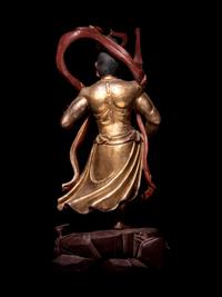 A Pair of Gilt and Red Lacquered Wood Figures of Guardians