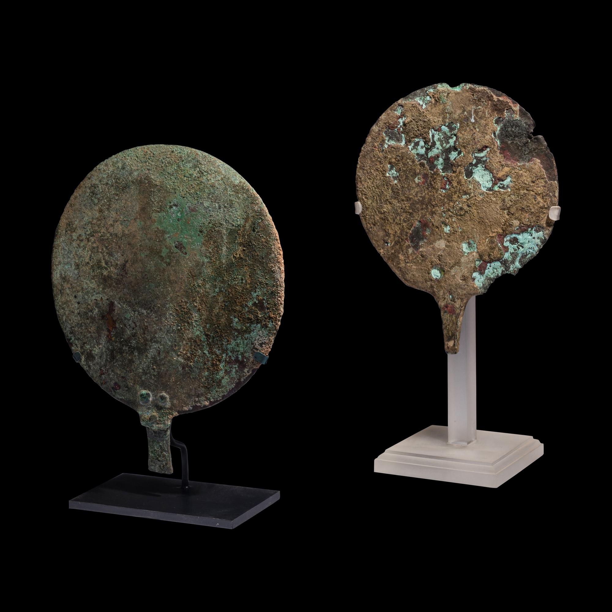 Two Roman Bronze Hand Mirrors