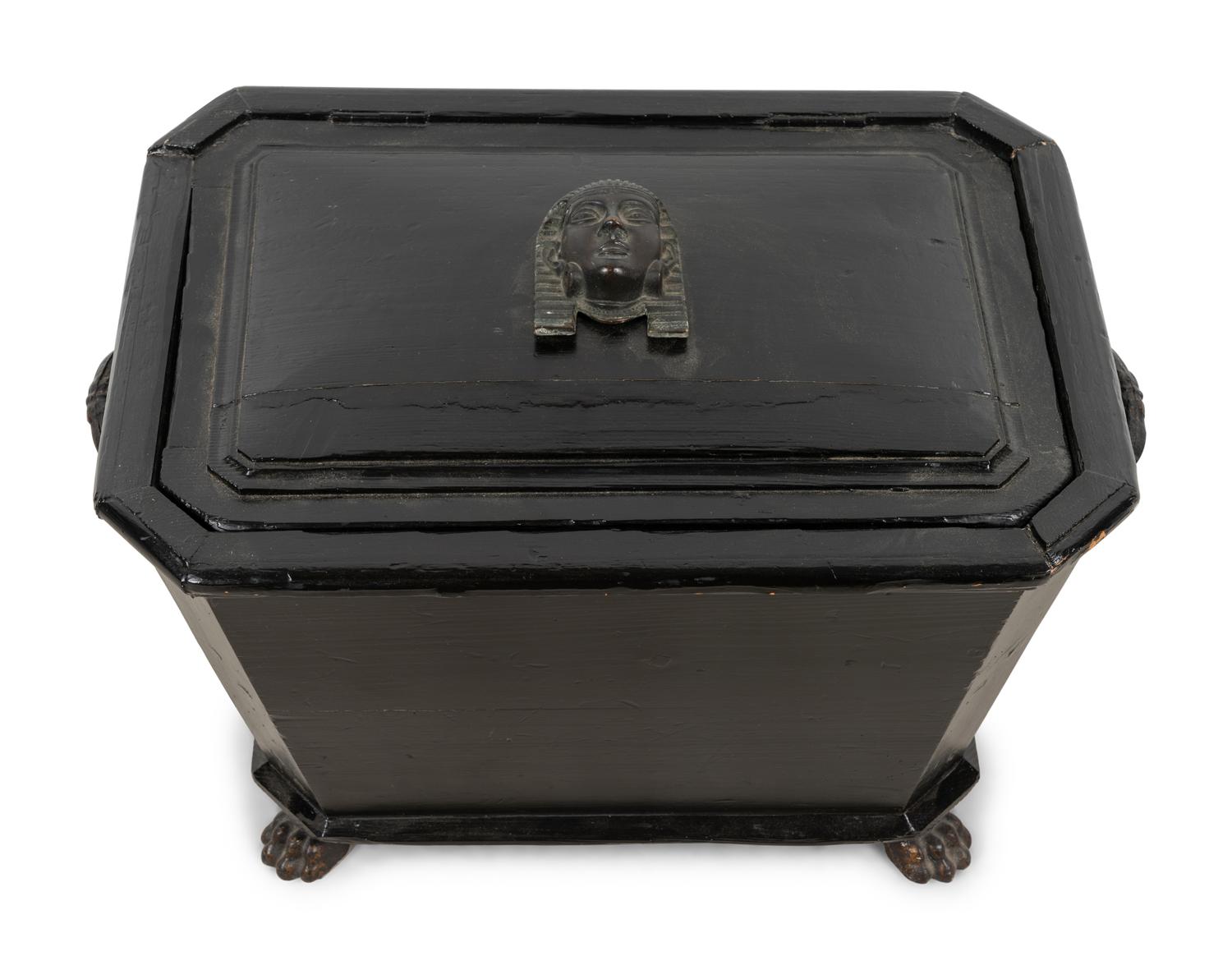 An Egyptian Revival Ebonized Coal Hod