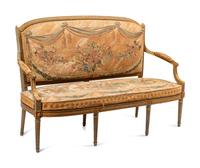 A Louis XVI Painted and Parcel Gilt Settee