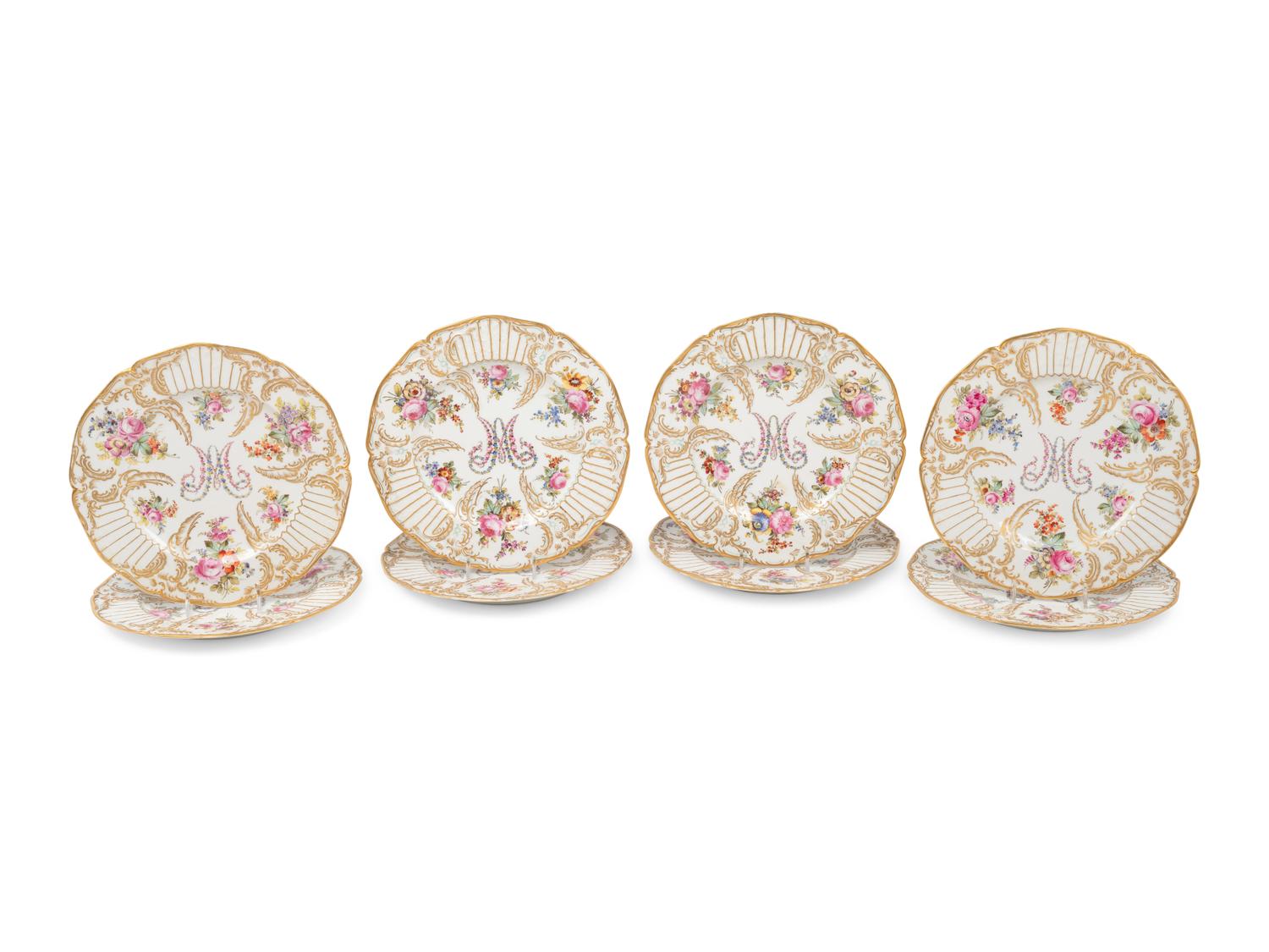 A Set of Eight French Porcelain Plates
