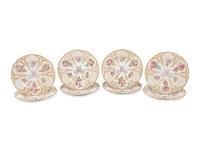 A Set of Eight French Porcelain Plates