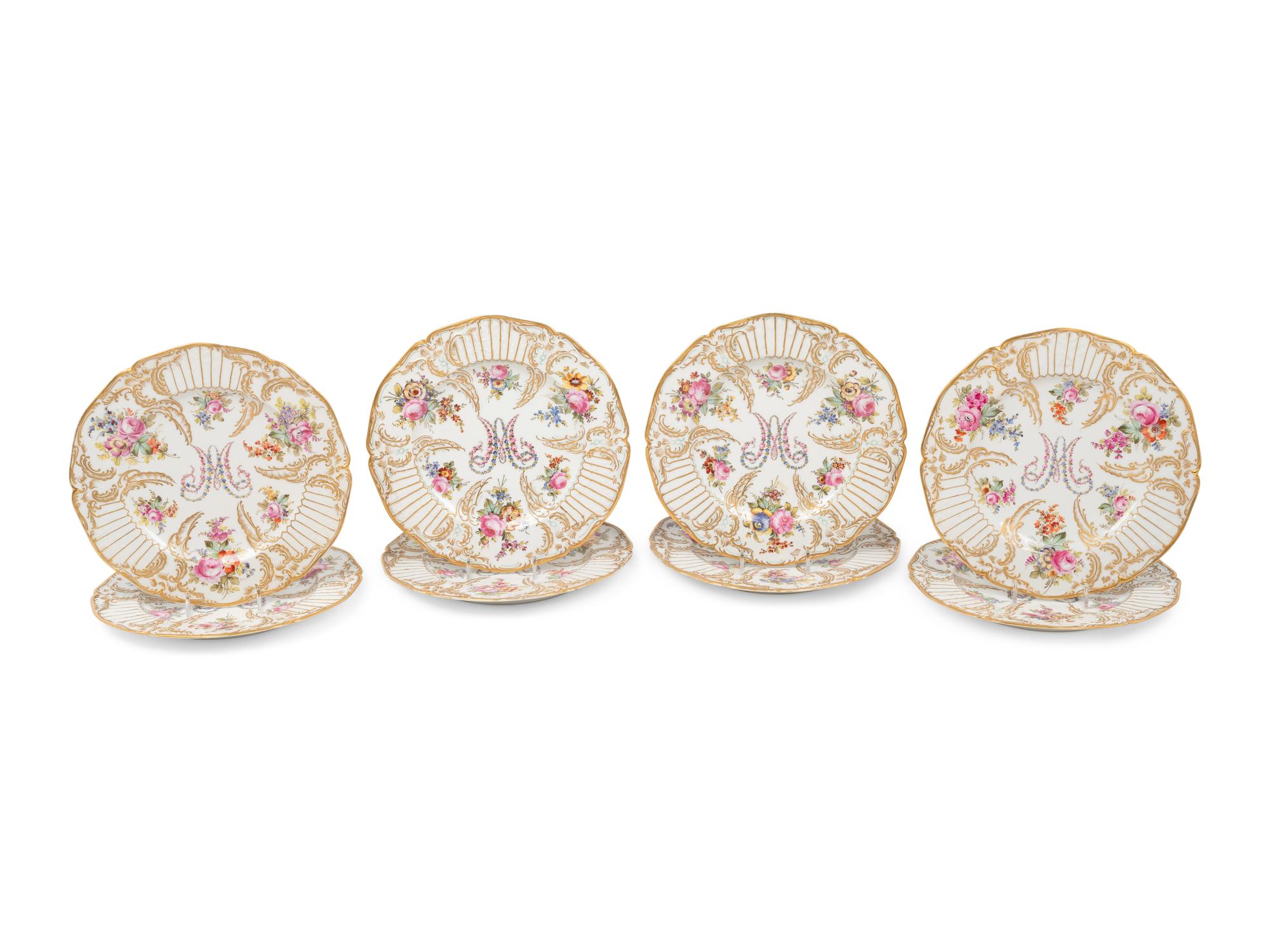 A Set of Eight French Porcelain Plates