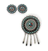 A Zuni Jet, Coral and Turquoise Brooch, Ben and Shirley Tzunie Diameter of brooch 2 1/2 inches.