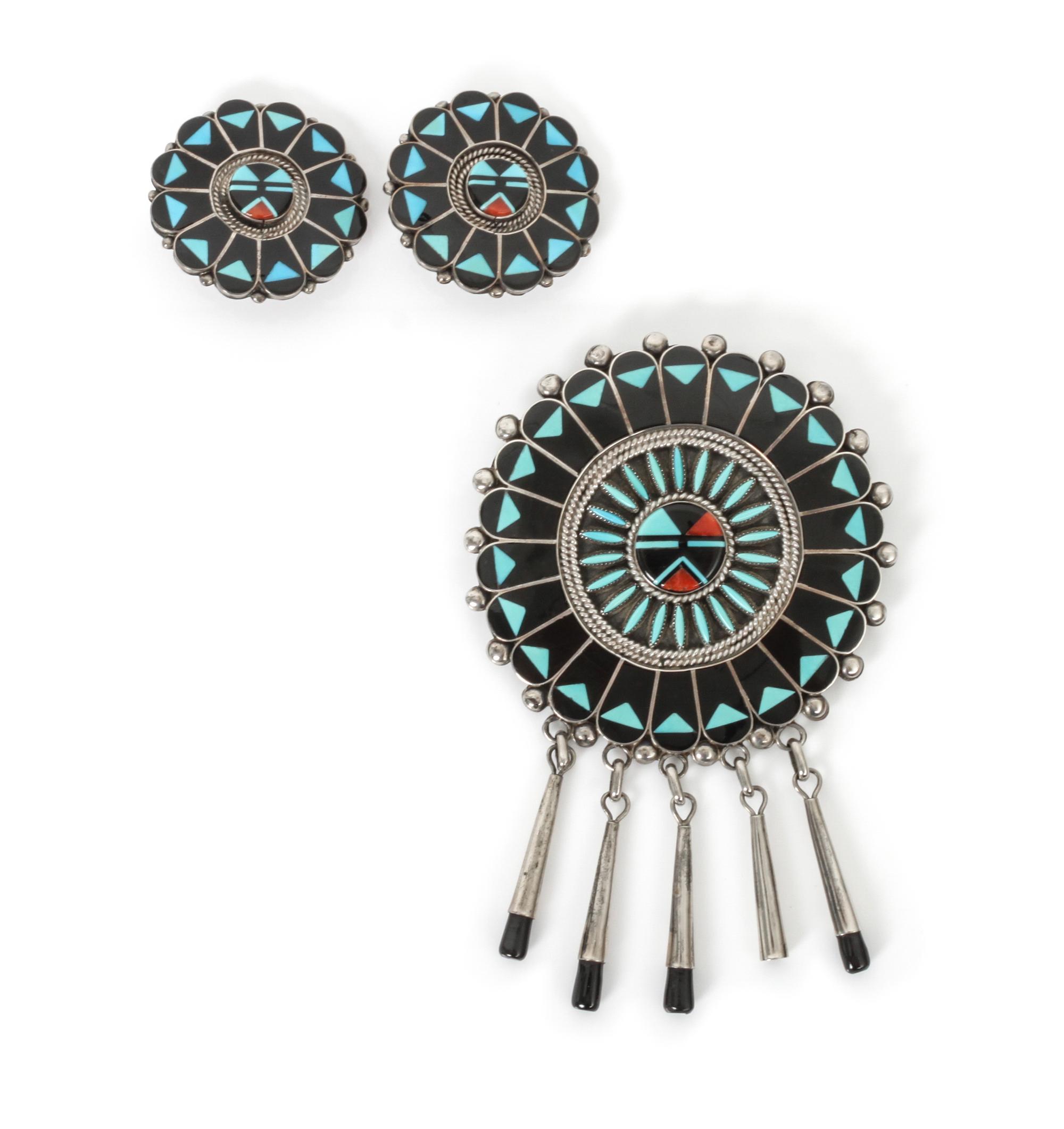 A Zuni Jet, Coral and Turquoise Brooch, Ben and Shirley Tzunie Diameter of brooch 2 1/2 inches.