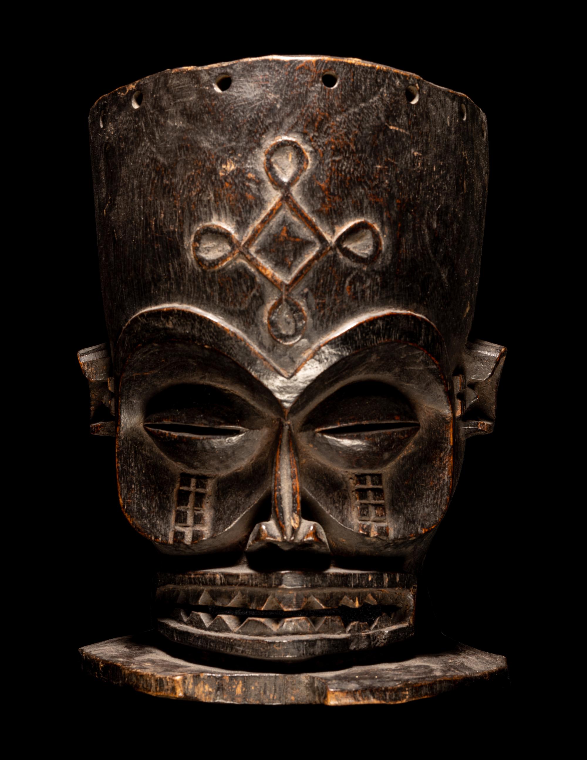 A Chokwe Wood Helmet Mask