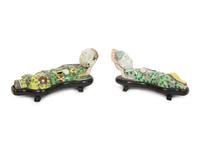 A Pair of Chinese Porcelain Reclining Figures