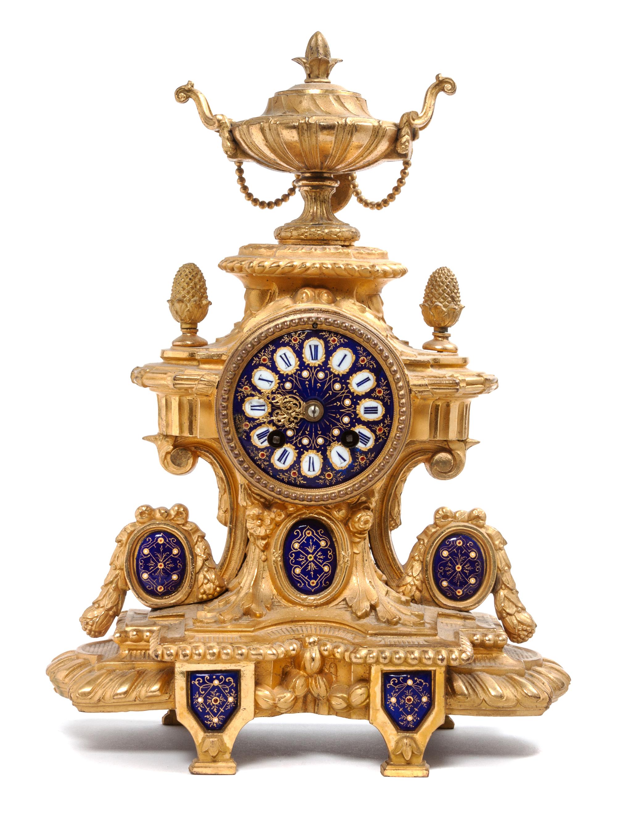 A Viennese Gilt Bronze Clock Height 15 inches.