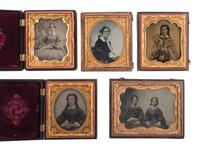 [EARLY PHOTOGRAPHY]. A group of 20 assorted portraits of women of varying ages, highlighted by half plate daguerreotype of two women, possibly sisters.