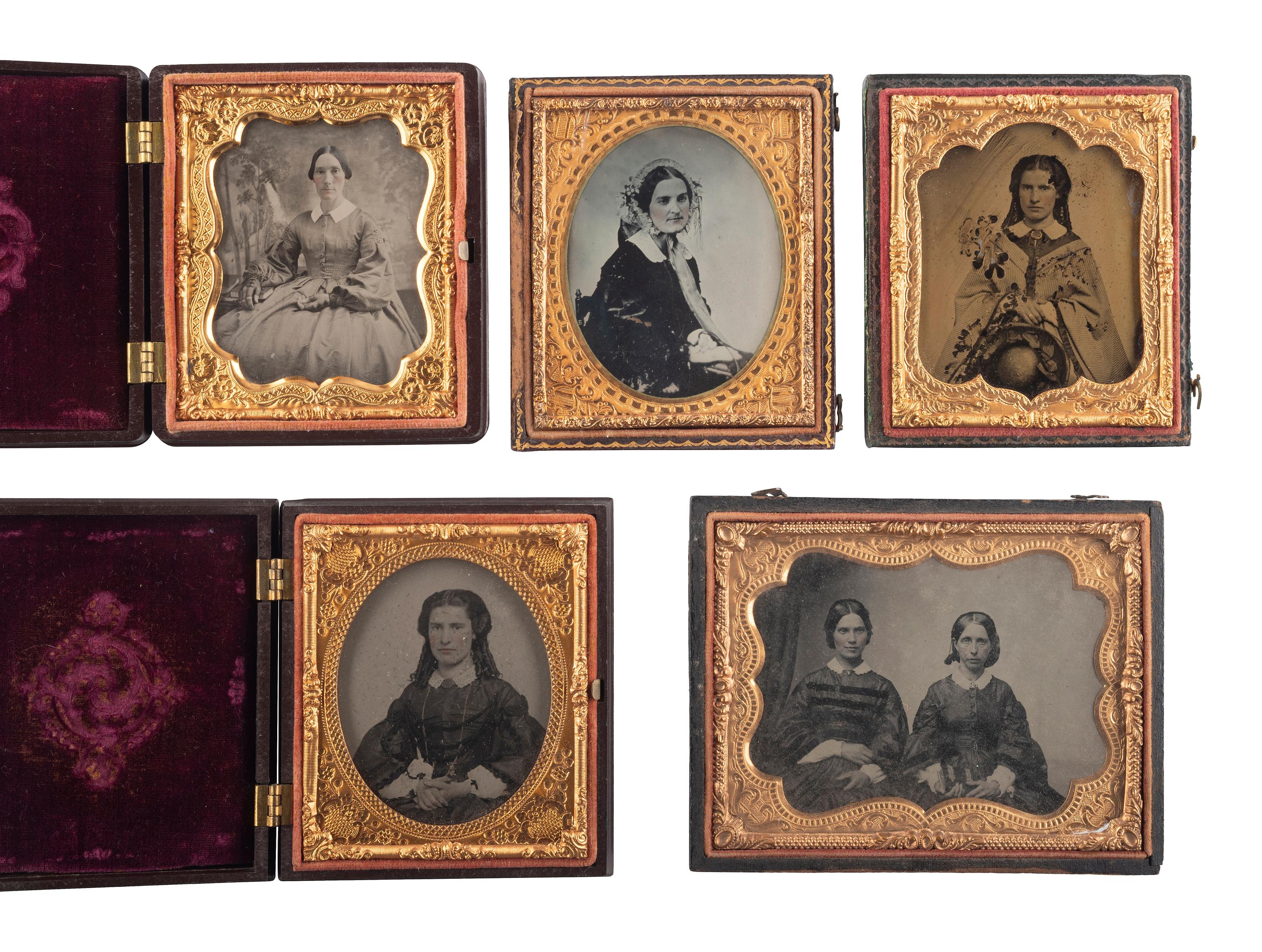 [EARLY PHOTOGRAPHY]. A group of 20 assorted portraits of women of varying ages, highlighted by half plate daguerreotype of two women, possibly sisters.