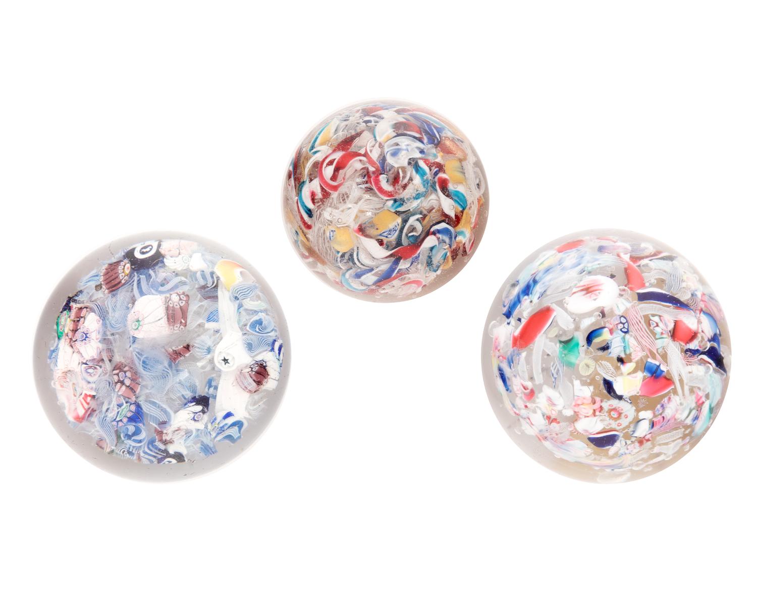Three End-of-Day Scrambled Cane Glass Paperweights