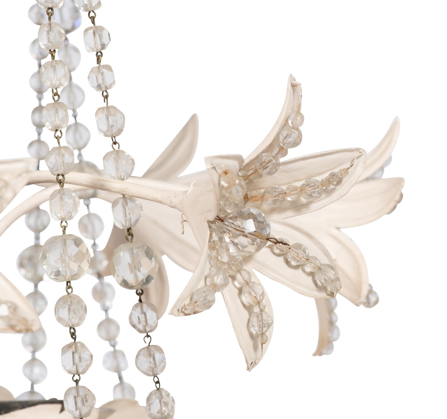 A Pair of Painted Metal and Cut Glass Eight-Light Chandeliers