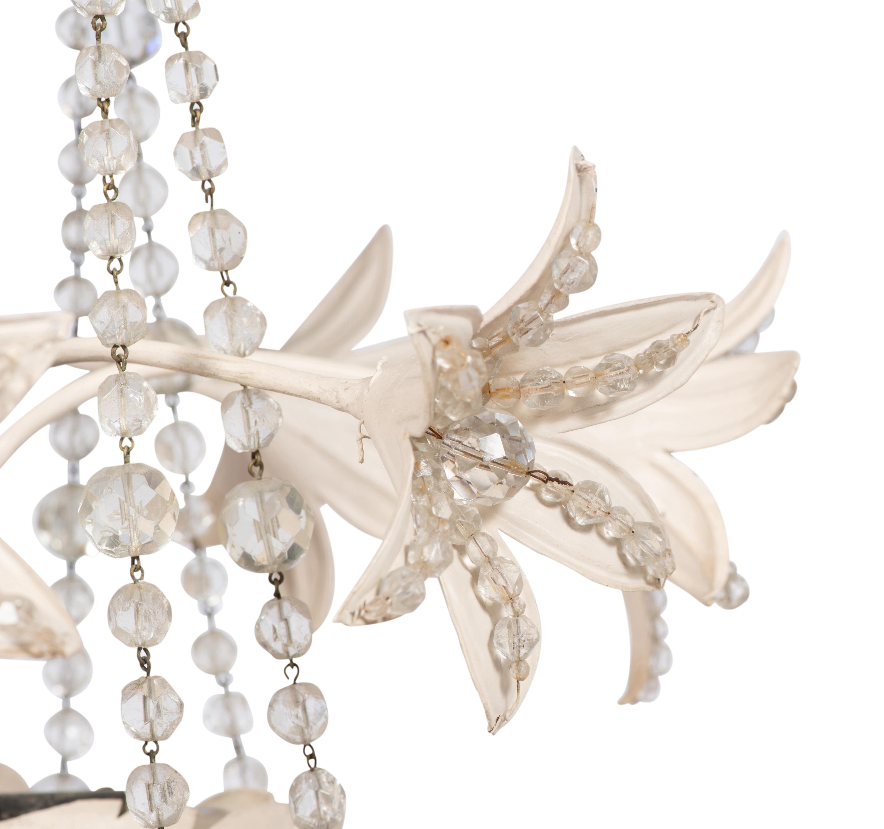 A Pair of Painted Metal and Cut Glass Eight-Light Chandeliers