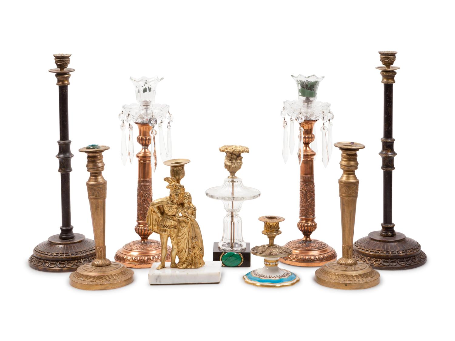 A Group of Nine Candlesticks