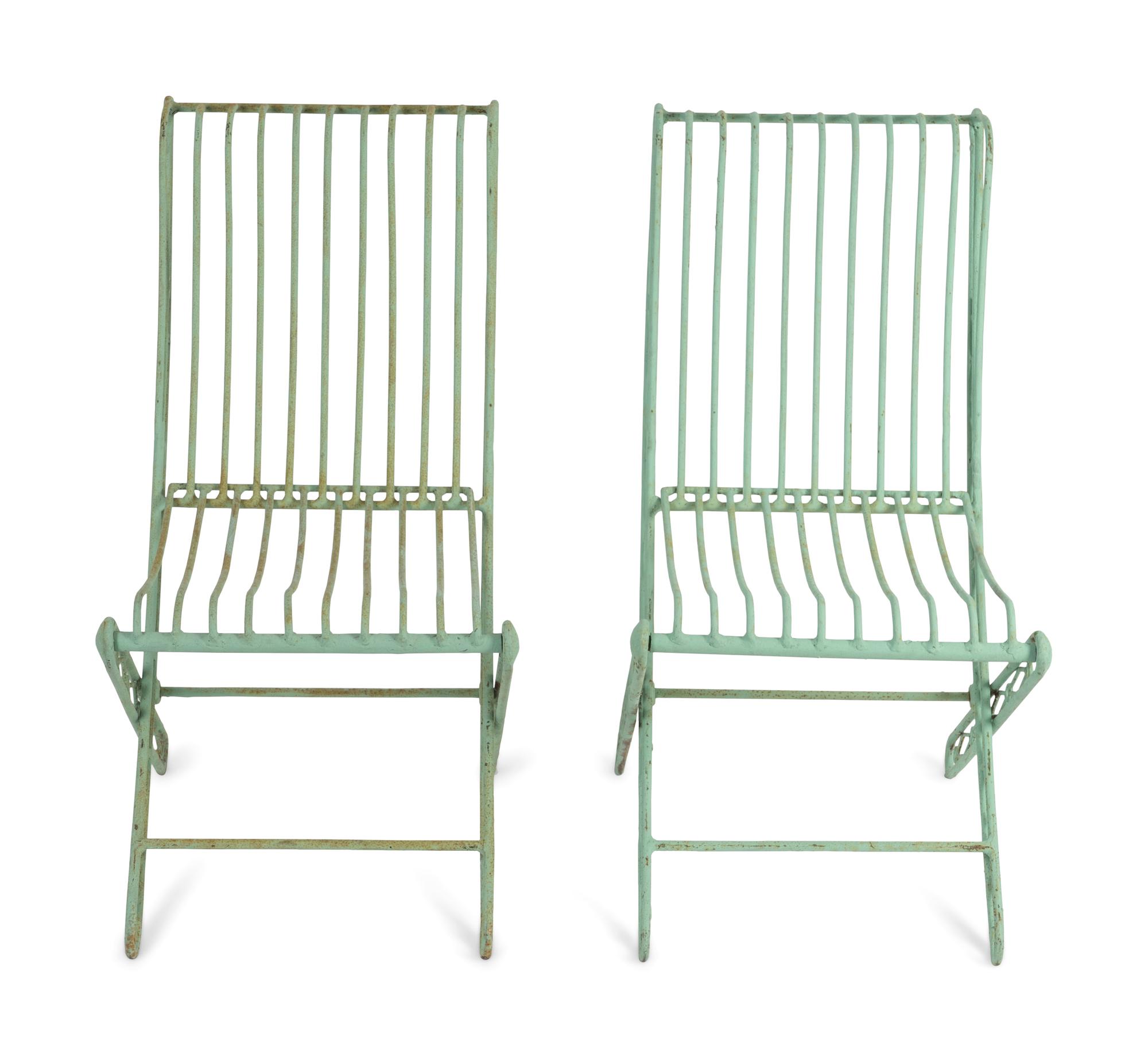 A Set of Four Green Painted Wrought Iron Folding Chairs and Two Folding Metal Armchairs — 20TH CENTURY