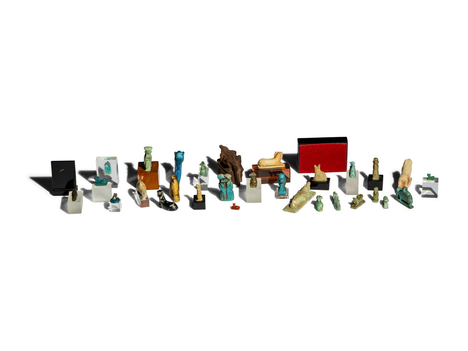 31 Egyptian Faience, Wood, and Stone Animals