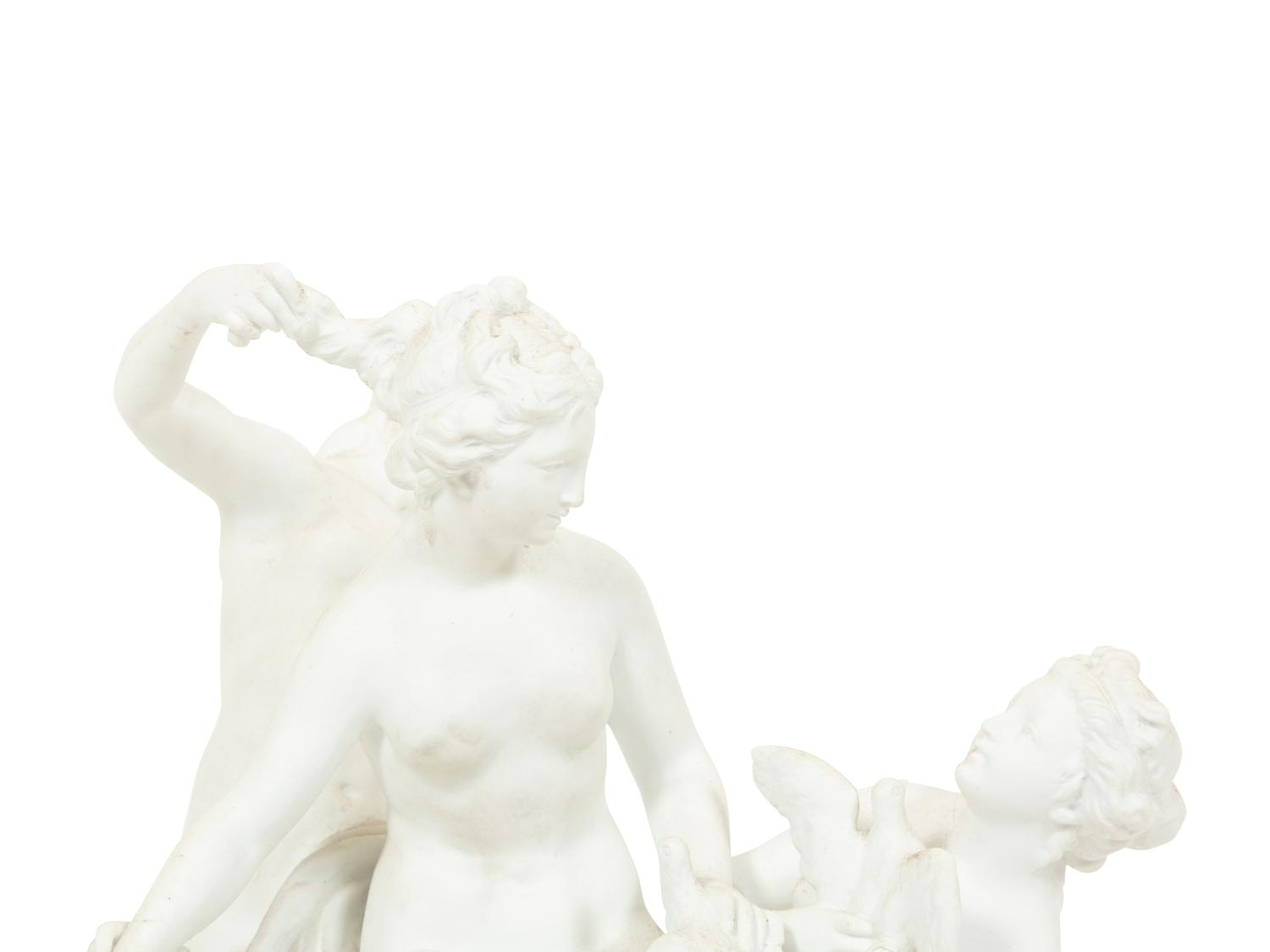 A Sèvres Bisque Porcelain Toilette de Venus Figural Group
